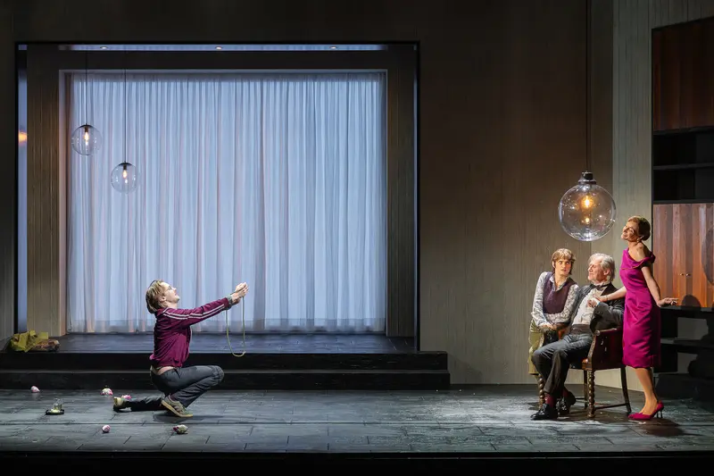 Theater in der Josefstadt Production: Actor Kneeling Before Observers