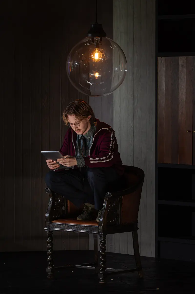 Actor on Stage with Mobile Device at Kammerspiele der Josefstadt, Vienna