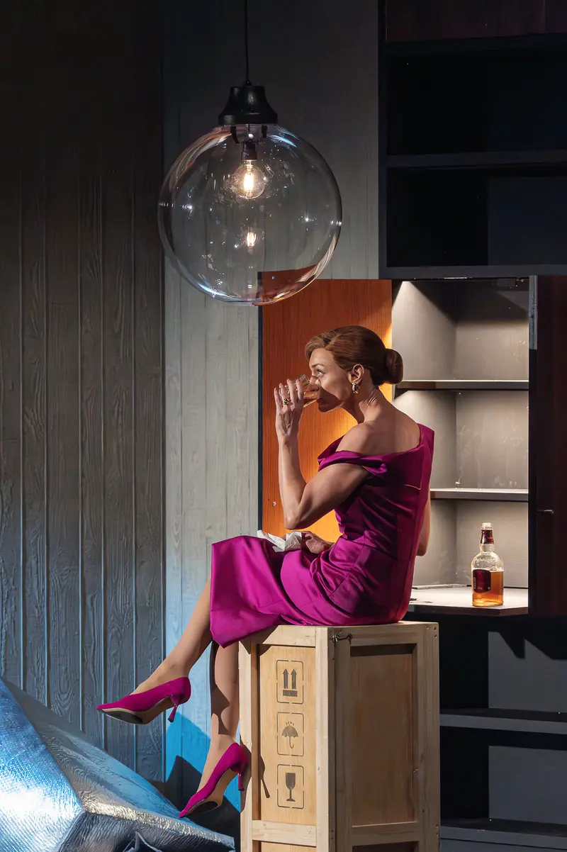 Performer in Purple Dress at Kammerspiele der Josefstadt Vienna Production