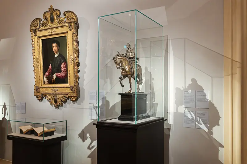 Renaissance Portrait and Equestrian Sculpture in Museum Display