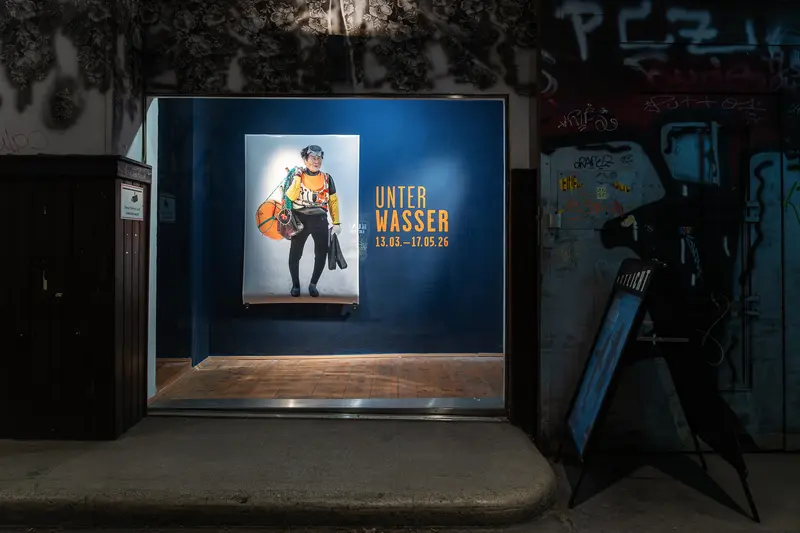 Underwater Exhibition Window Display with Diver Portrait