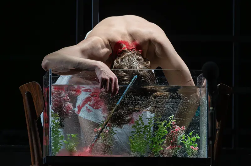 Julian Valerio Rehrl Performs in Water Tank with Flowering Plants, Vienna 2026