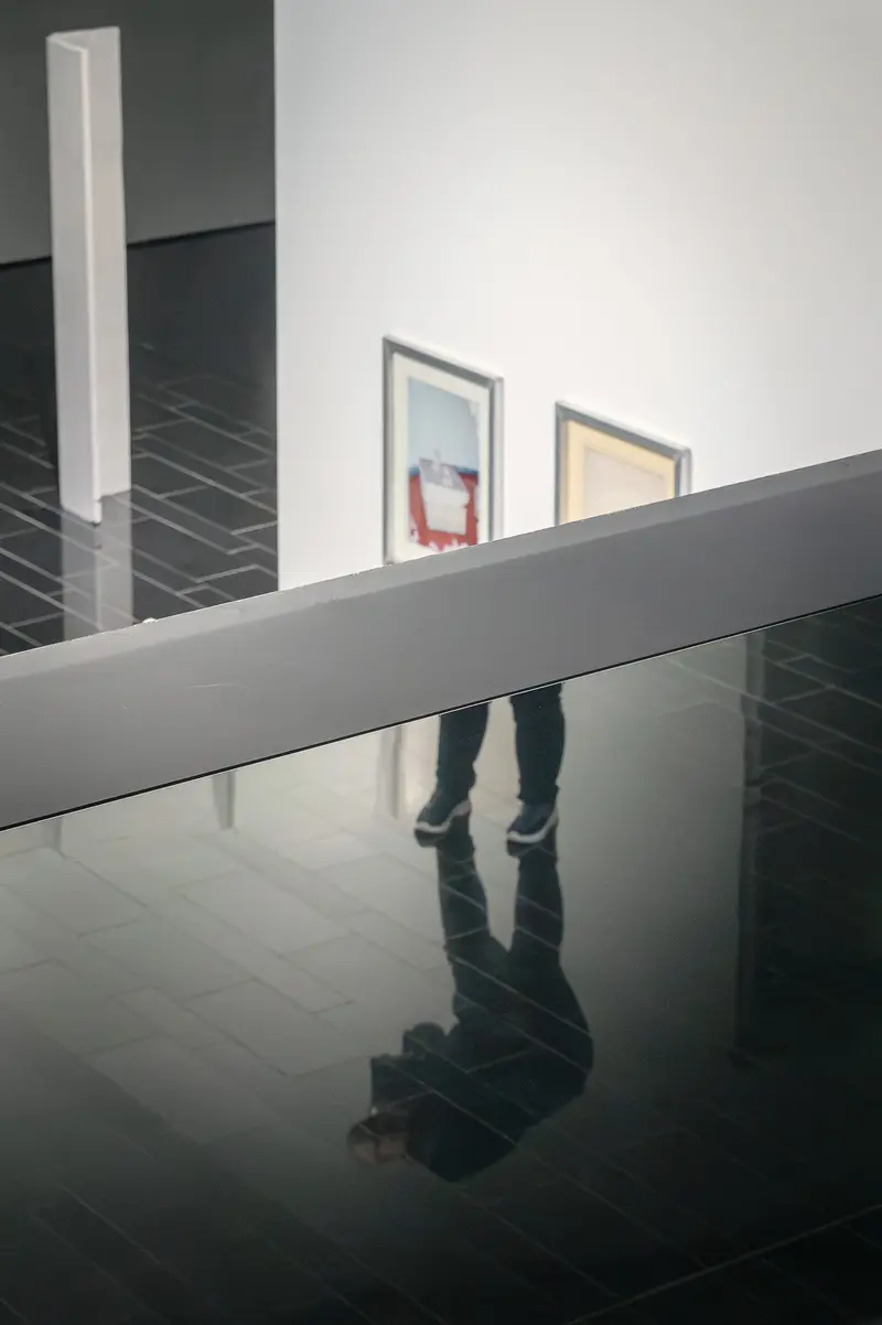 Reflection of Visitor Viewing Emma Hummerhielm Carlén's By the Wall Exhibition