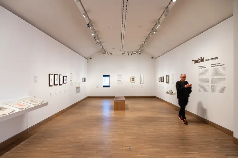 Visitor Viewing Framed Works at Tanzbild Exhibition, Albertina Modern Vienna
