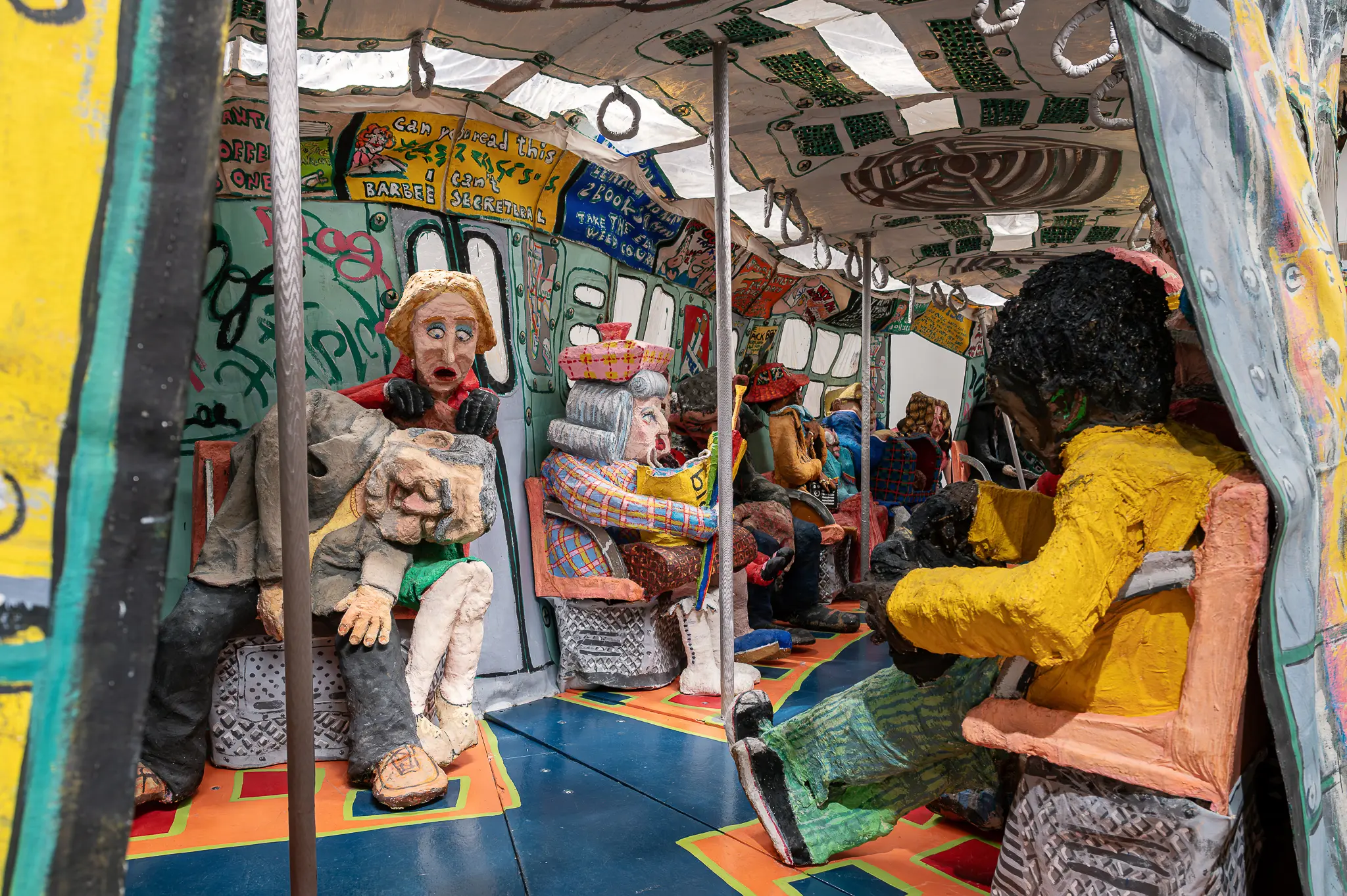 Visitor Photographs Interior of Red Grooms' Ruckus Manhattan Subway Sculpture