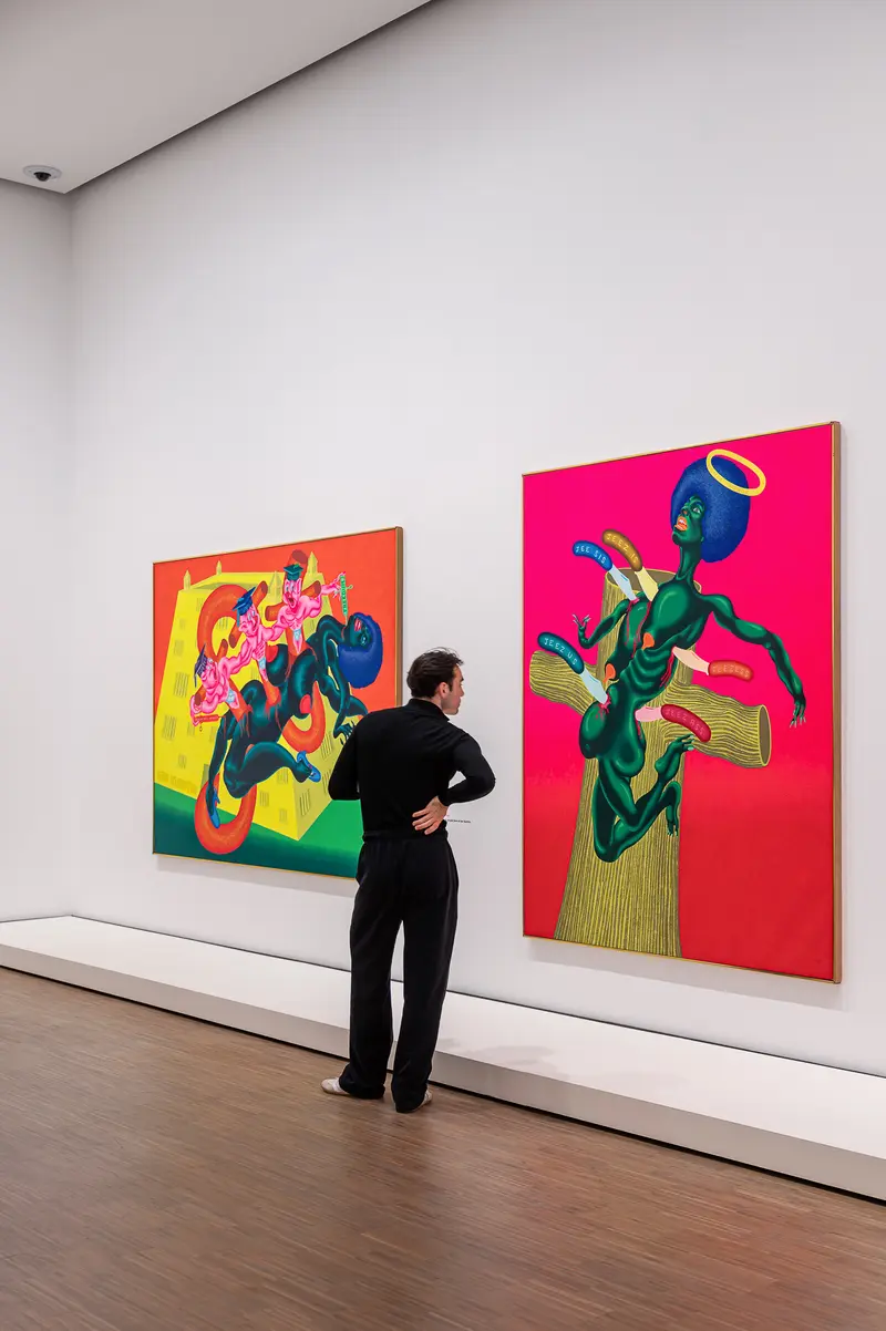 Visitor Viewing Colorful Figurative Paintings at Albertina Modern Vienna Exhibition