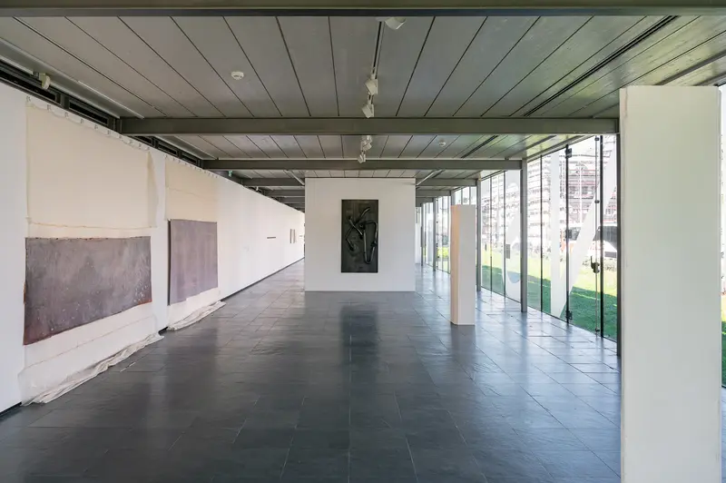 Contemporary Art Gallery Interior with Abstract Paintings and Natural Light