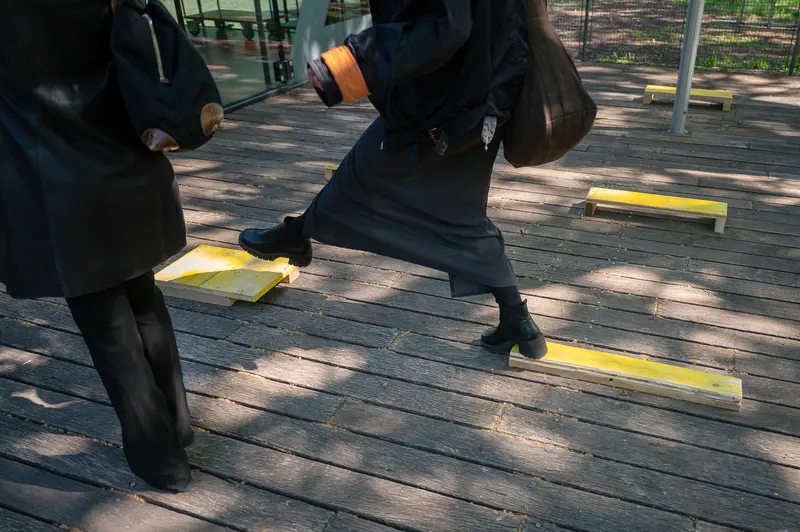 Cornhole Game Activity at Outdoor Wooden Deck Event
