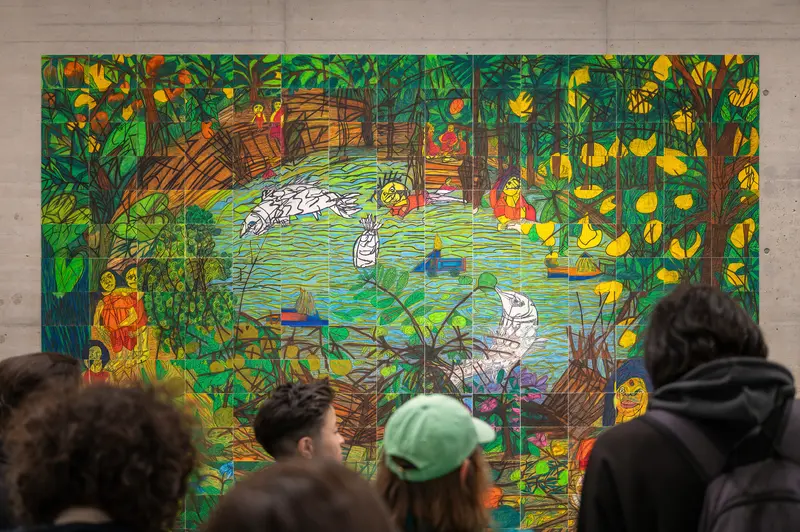 Visitors Viewing Vibrant Nature Scene Mural in Gallery
