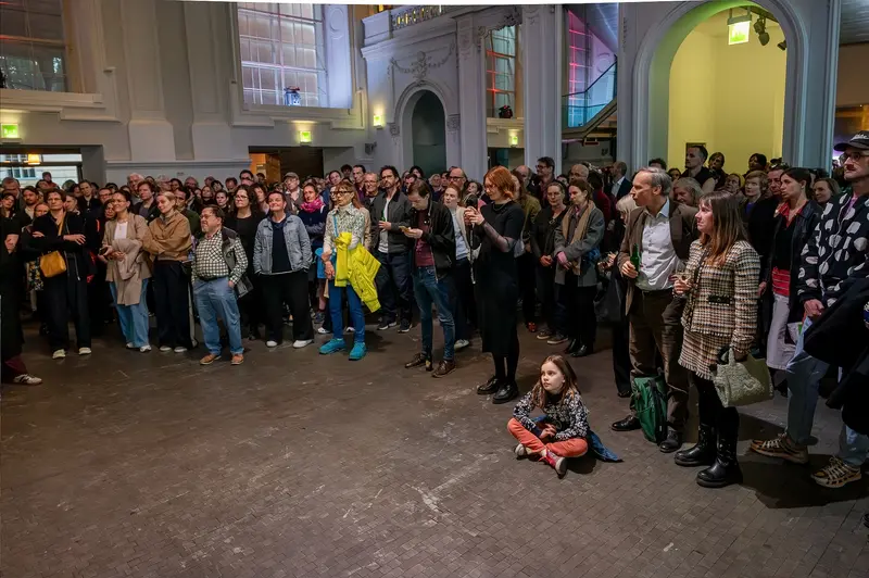 Child Seated in Center of Crowd at Kunsthalle Wien Opening, April 2026