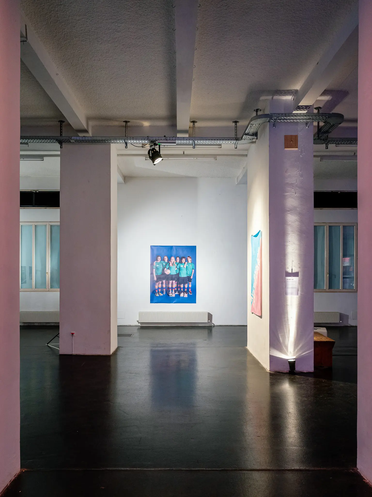 Contemporary Art Installation in Industrial Gallery Space with Structural Columns