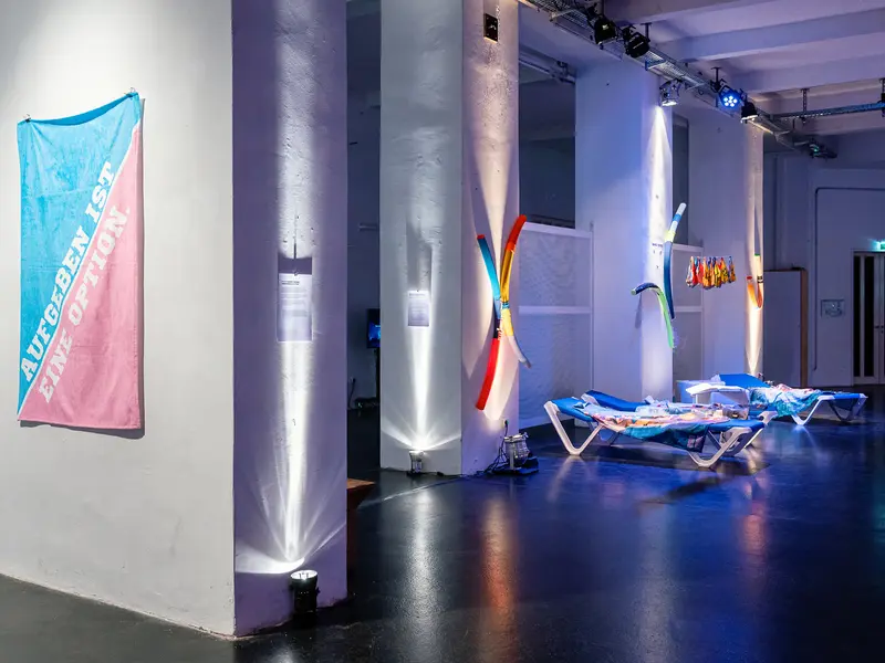 Contemporary Art Installation with Neon Light Sculptures and Fabric Banners