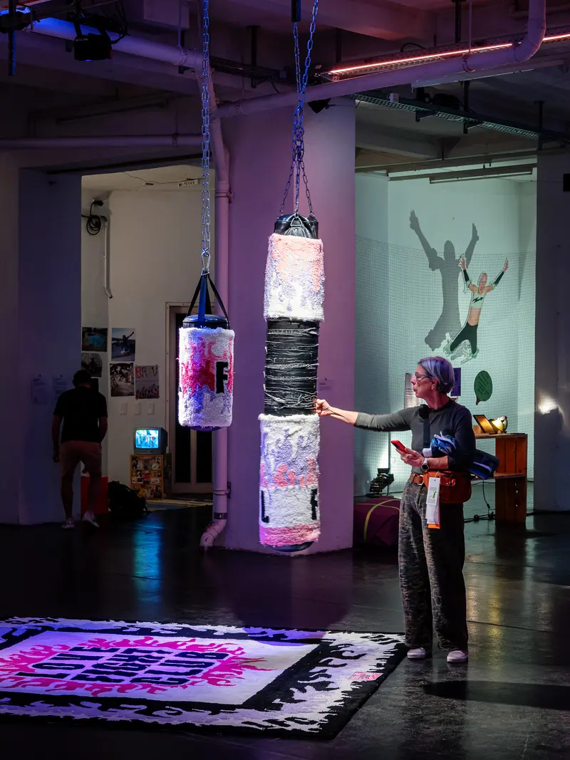 Interactive Light Installation with Suspended Illuminated Cylinders in Contemporary Gallery