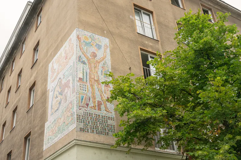 Socialist Realist Mural with Cyrillic Text on East German Apartment Building