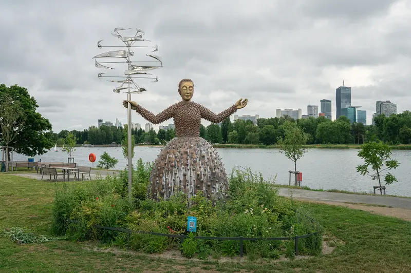 Monumental Sculptural Figure with Outstretched Arms Overlooking Toronto Waterfront