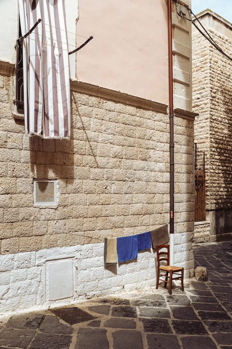 Clothesline and Chair in Mediterranean Courtyard
