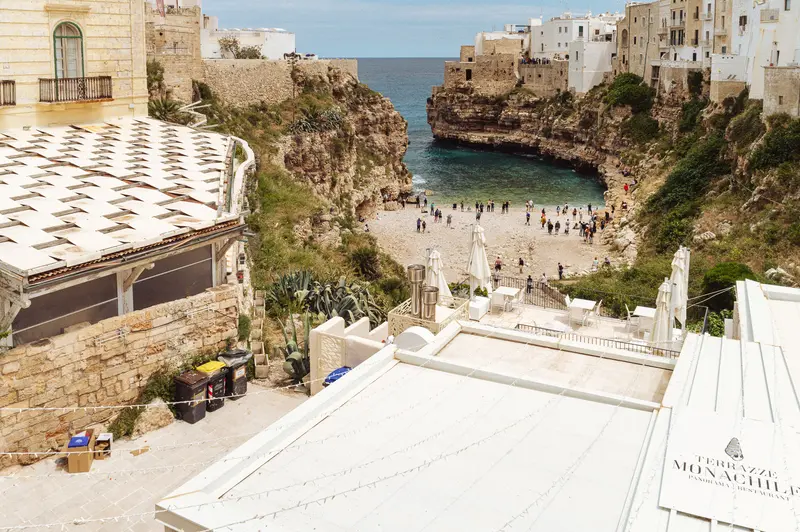 Coastal Italian Town with Rocky Cove and Mediterranean Beach