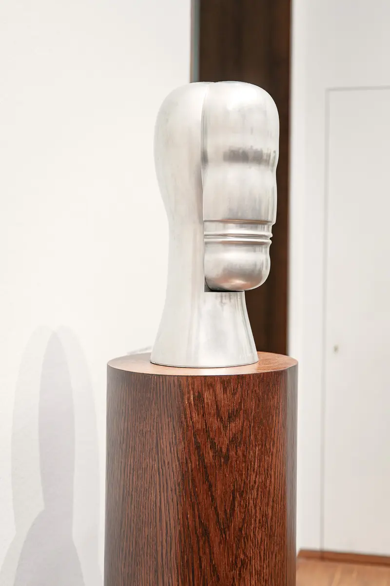 Abstract White Sculptural Form on Wooden Plinth