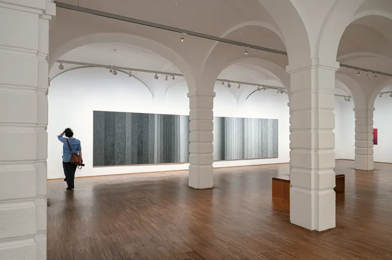 Contemporary Art Installation in Modernist Gallery Space with Architectural Columns