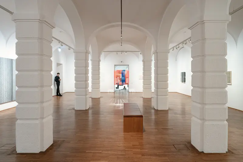 Contemporary Art Gallery with Columns and Minimalist Installation