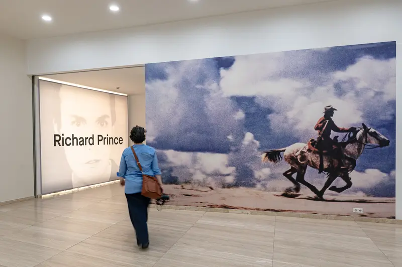 Richard Prince Exhibition with Cowboy Photography and Portrait Display