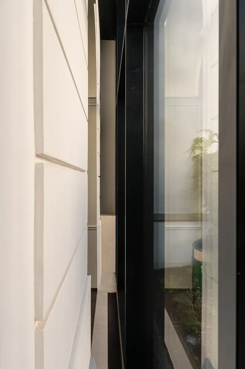Narrow Passage Between White and Black Walls at Palais Chotek Vienna