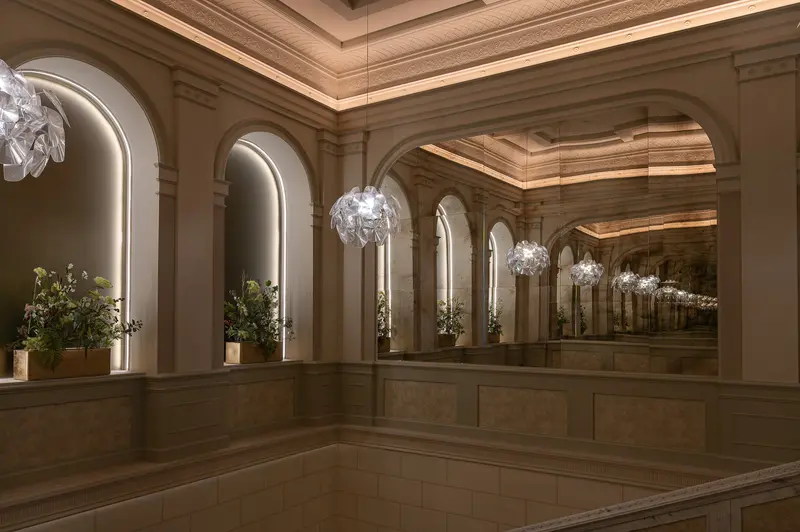 Palais Chotek Vienna Gallery Interior with Arched Alcoves and Hanging Installations