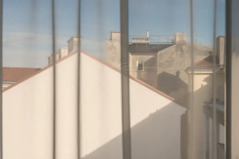 Urban Roofscape View Through Window at IgersWalk Vienna 2026