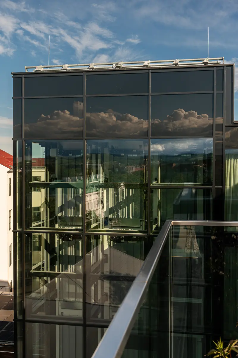 Reflected Architecture and Sky in Glass Facade at IgersWalk Vienna 2026