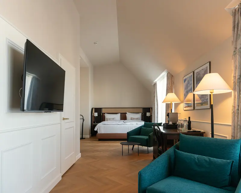 Hotel Suite at Palais Chotek Vienna with Bedroom and Living Area