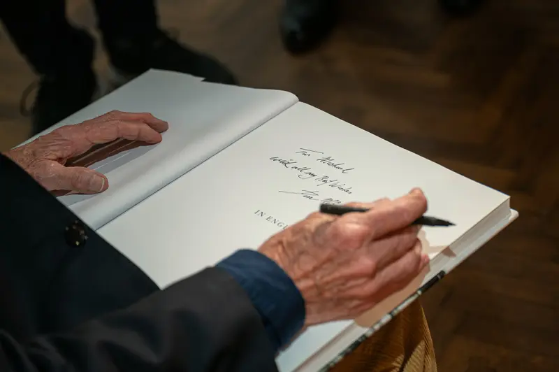Don McCullin Signs Book with Personal Dedication at Leica Gallery Vienna
