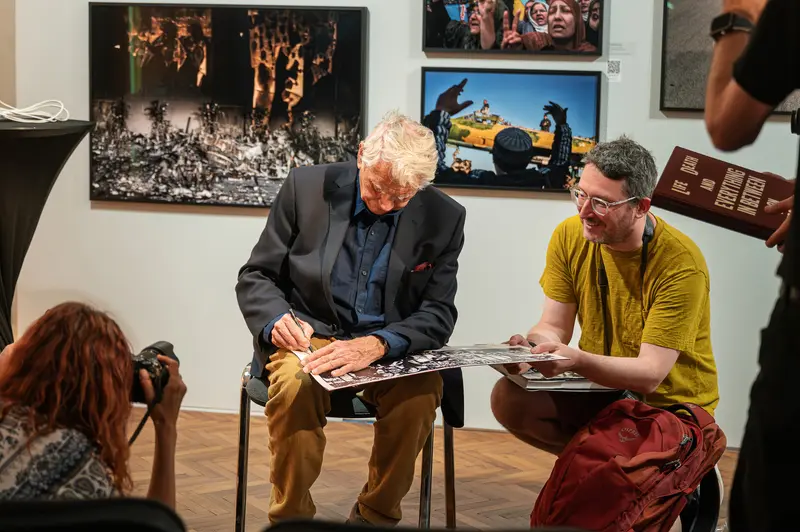 Sir Don McCullin Signs Books at Leica Gallery Vienna Event