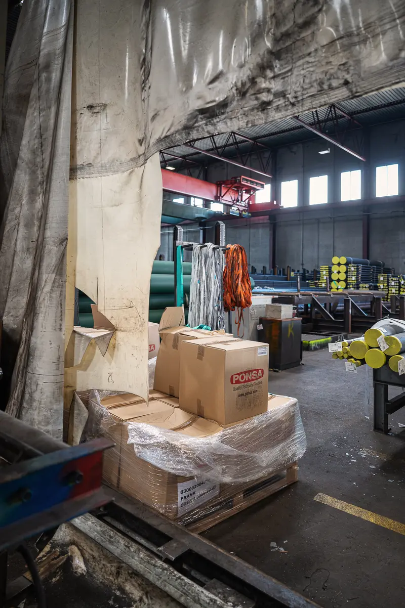 Cardboard Boxes and Plastic-Wrapped Pallet in Frankstahl Warehouse Hall