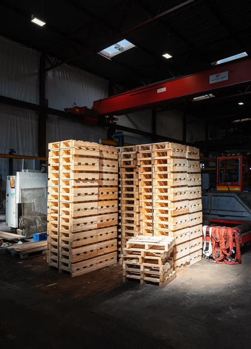 Stacked Wooden Pallets in Frankstahl Guntramsdorf Warehouse Hall