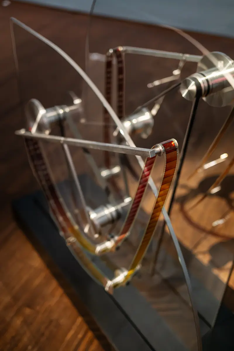 Film Strip Sculpture or Kinetic Artwork on Display in Gallery