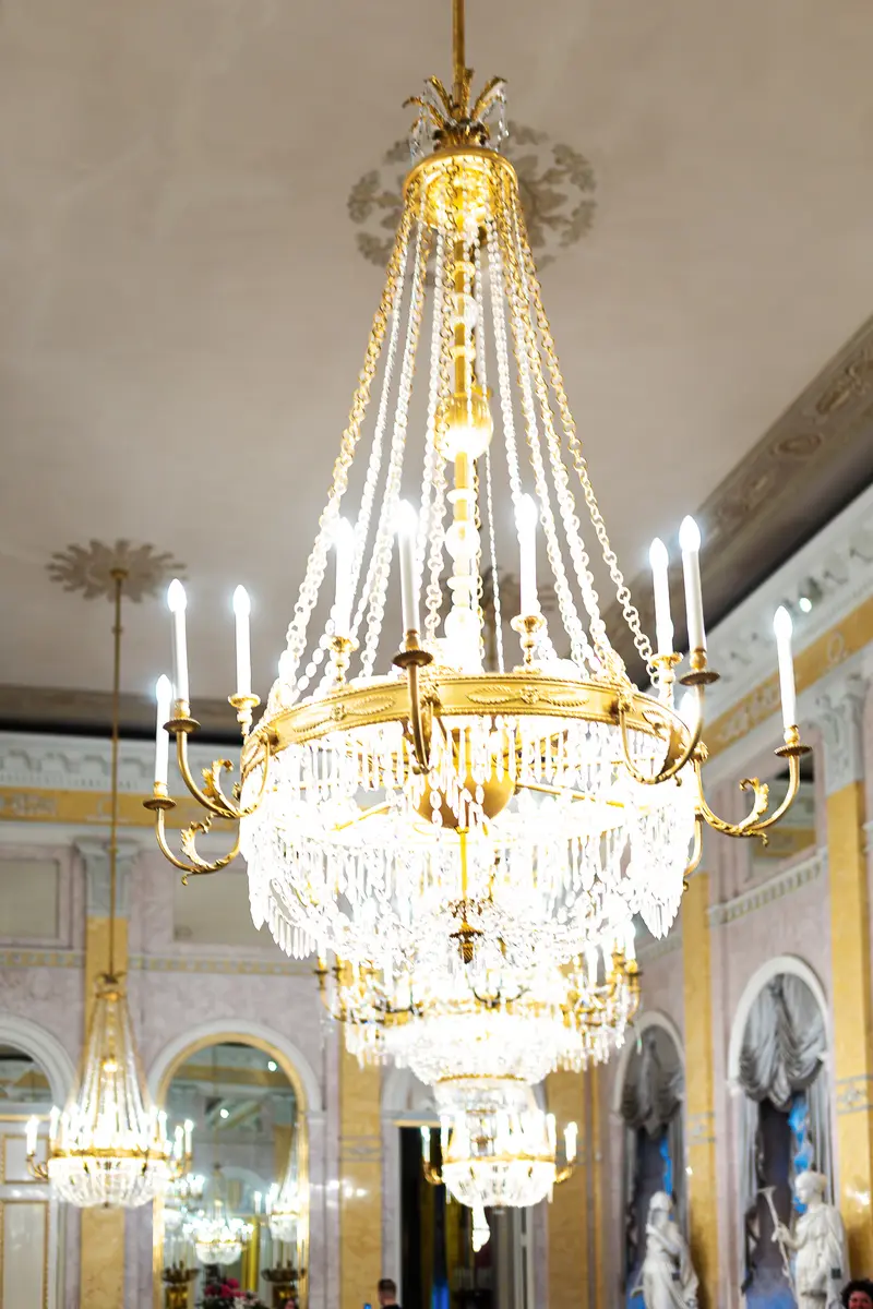Empire-Style Crystal and Gilt Chandelier in Ornate Ceremonial Hall