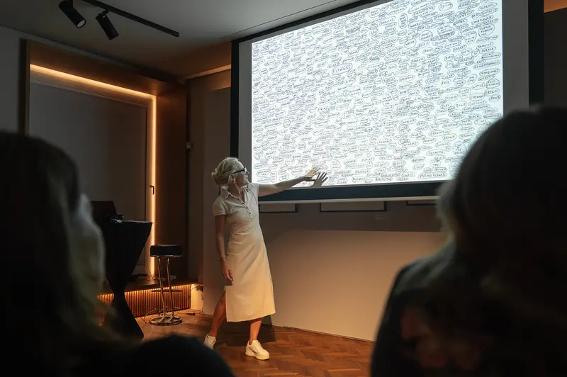 Cig Harvey Points to Projected Word Diagram During Artist Talk, Leica Gallery Vienna, Sep 29th, 2026