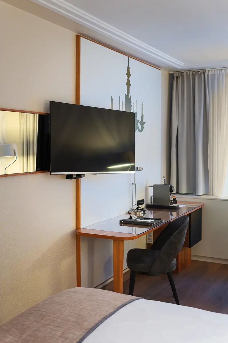Guest Room Desk, Flat-Screen TV and Chandelier Mural at Hotel Das Tigra, Vienna