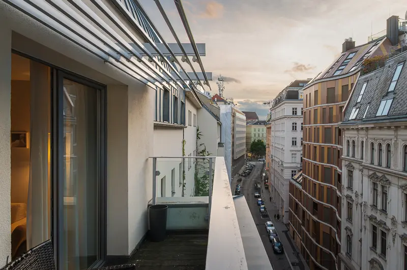 Rooftop terrace at Hotel Das Tigra overlooking Tiefer Graben, Vienna