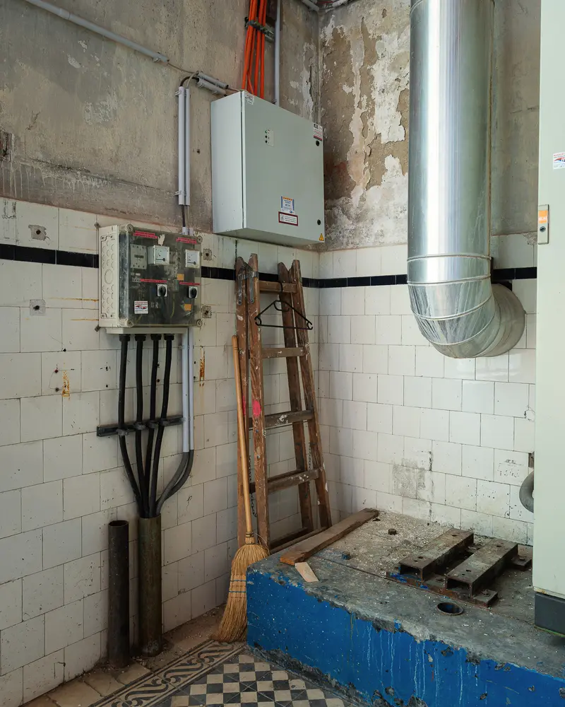 Disused electrical switchgear and machine plinth in Glanzstoff St. Pölten interior, Open House 2026