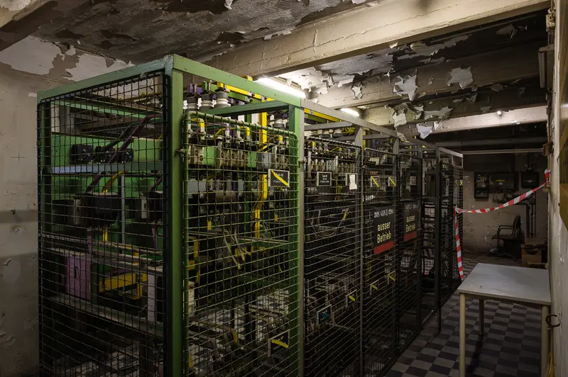 Decommissioned Switchgear Room Behind Green Mesh Cages at Glanzstoff St. Pölten Open House 2026