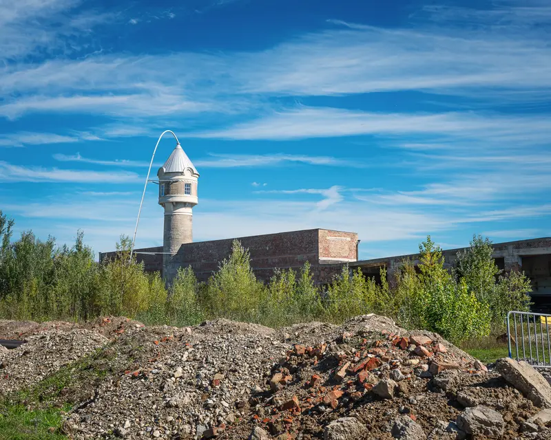 Glanzstoff water tower behind demolition rubble at Open House 2026, St. Pölten