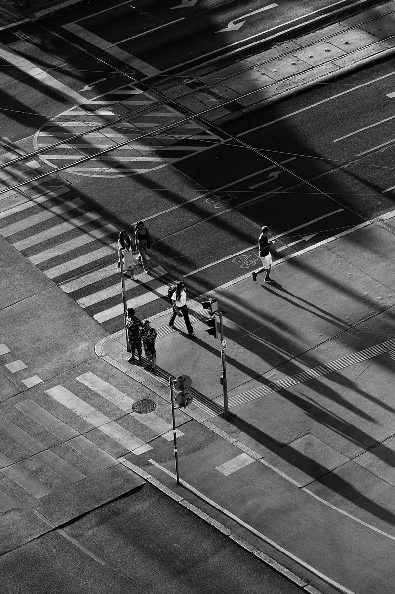 Pedestrians at Vienna Innere Stadt intersection during the 12 August 2026 solar eclipse